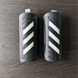 Adidas Black Shin Guards with White Stripes
